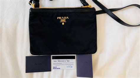 prada bandoliera tessuto bag|Prada bag with small pouch.